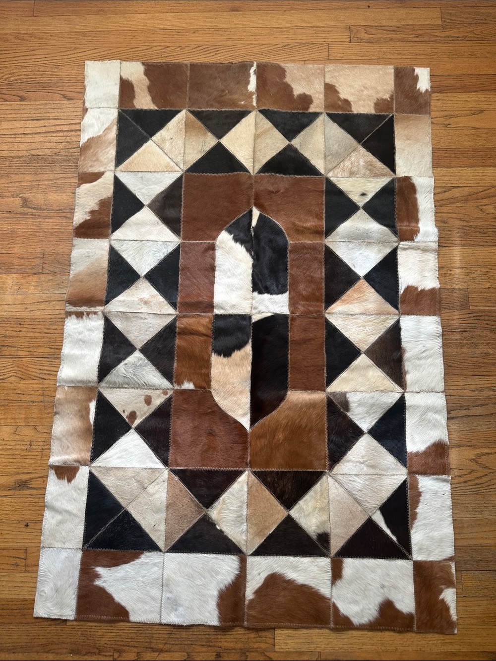 Hand Crafted Brown, White and Black Geometric Patchwork Cowhide Rug
